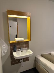 Kupatilo u objektu Skogar Hostel