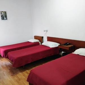 Postel nebo postele na pokoji v ubytování Residencial Ski