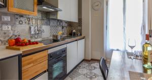 Kuchyň nebo kuchyňský kout v ubytování 5 Min dal Mare Centro Wi-fi & Balcone