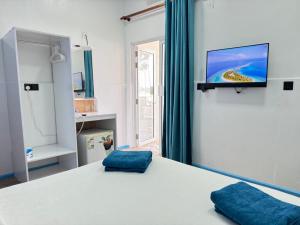 Voodi või voodid majutusasutuse Ithaa Seaview toas