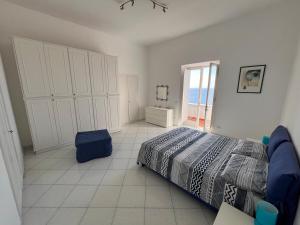 Ένα ή περισσότερα κρεβάτια σε δωμάτιο στο Apartment in Marina Piccola