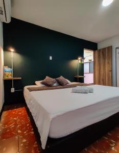 Postel nebo postele na pokoji v ubytování Zamia Hostel