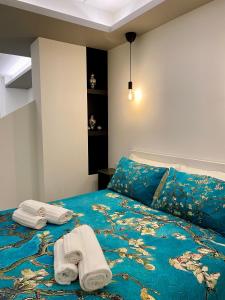 Postel nebo postele na pokoji v ubytování NEW Residenza le Essenze - i 7 Laghi