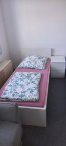 Letto o letti in una camera di Berzi Gemeinschaft Zimmer