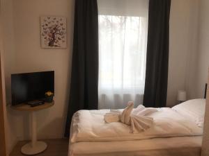 Hotel am Wasserturmにあるベッド