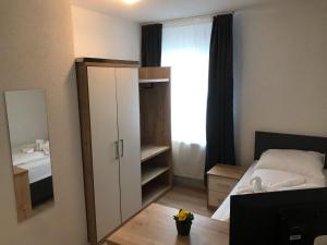 Hotel am Wasserturmにあるベッド