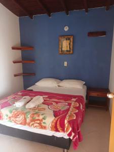 Letto o letti in una camera di Hotel Lagos de Guatape
