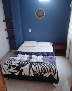 Letto o letti in una camera di Hotel Lagos de Guatape