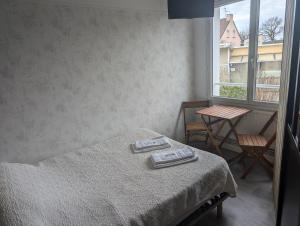 Postel nebo postele na pokoji v ubytování La cocotte normande