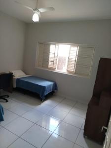 Postel nebo postele na pokoji v ubytování Refúgio Hostel Unidade 2