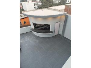 En balkon eller terrasse på Hotel O Ramyanika