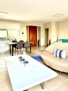 A kitchen or kitchenette at Grand Afroditi LUX