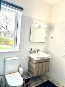 A bathroom at Grand Afroditi LUX