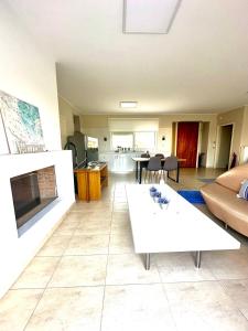 A kitchen or kitchenette at Grand Afroditi LUX