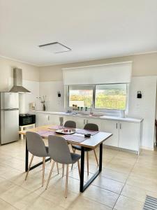 A kitchen or kitchenette at Grand Afroditi LUX