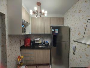 Η κουζίνα ή μικρή κουζίνα στο apartment for up to 7 people next to GRU +55 φωτογραφίες
