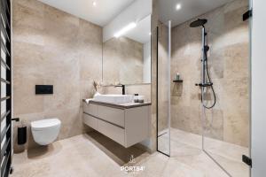 Baðherbergi á Waterfront Suite List auf Sylt