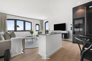 TV a/nebo společenská místnost v ubytování Times Square Penthouse List auf Sylt