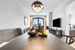 TV a/nebo společenská místnost v ubytování Turtle Bay Suite List auf Sylt