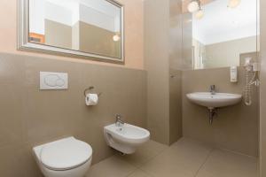 Kúpeľňa v ubytovaní Hotel Floryan Old Town + 30 fotografií