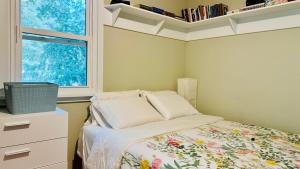 Postel nebo postele na pokoji v ubytování Joy House