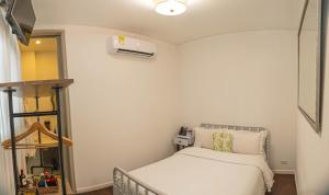 Postel nebo postele na pokoji v ubytování Hotel Monaguillo de Getsemaní