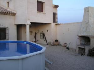 a large swimming pool in front of a building at VENTA DE LA SISA in Sisante