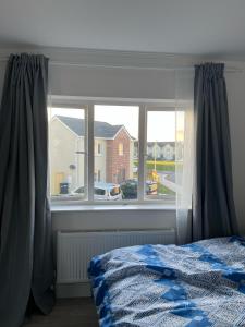Postel nebo postele na pokoji v ubytování Tullow Road Carlow