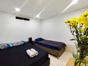 Postel nebo postele na pokoji v ubytování Mico Loco Casa Hostal + 25 fotografií