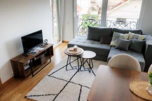 Ruang duduk di Duma Apartment