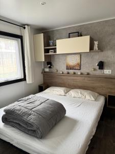 Katil atau katil-katil dalam bilik di Location Mobil-Home "Le Piriac'Home V2" +32 gambar