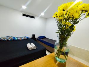 Postelja oz. postelje v sobi nastanitve Mico Loco Casa Hostal