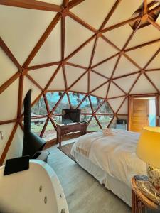 Cama ou camas em um quarto em Embaúba Boutique Hotel