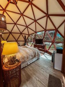 Cama ou camas em um quarto em Embaúba Boutique Hotel