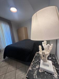 A bed or beds in a room at La casa di Marilena