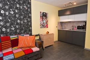 A kitchen or kitchenette at Eli Apartment Burgas Center