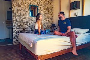 Ένα ή περισσότερα κρεβάτια σε δωμάτιο στο Wild Rover Beach Mancora