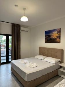 Postel nebo postele na pokoji v ubytování Molla Hotel Restorant