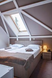 Postel nebo postele na pokoji v ubytování Complex Hotelier COTA O MIE