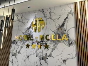 Certifikát, hodnocení, plakát nebo jiný dokument vystavený v ubytování Molla Hotel Restorant