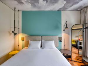 Ένα ή περισσότερα κρεβάτια σε δωμάτιο στο ibis Berlin Kurfuerstendamm - neu renoviert