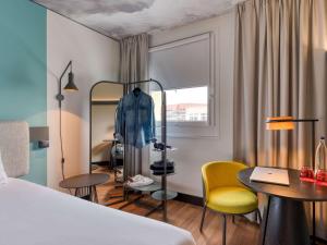 Ένα ή περισσότερα κρεβάτια σε δωμάτιο στο ibis Berlin Kurfuerstendamm - neu renoviert
