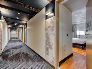 Ένα ή περισσότερα κρεβάτια σε δωμάτιο στο ibis Berlin Kurfuerstendamm - neu renoviert
