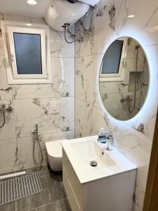 Ένα μπάνιο στο IONIAN HEAVEN APARTMENTs