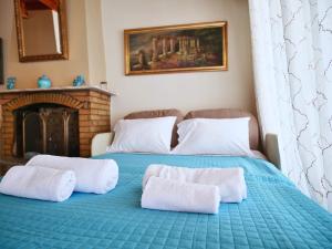 Ένα ή περισσότερα κρεβάτια σε δωμάτιο στο Verga Beachfront House Villa