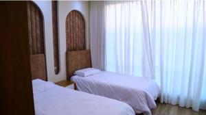 Ένα ή περισσότερα κρεβάτια σε δωμάτιο στο Fully Furnished luxurious villa +37 φωτογραφίες