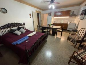 Ένα ή περισσότερα κρεβάτια σε δωμάτιο στο Dulce Hogar