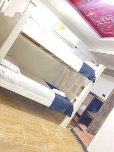 Postel nebo postele na pokoji v ubytování Neos Hotel Cartagena