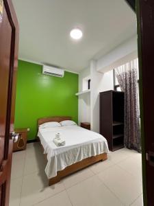 Katil atau katil-katil dalam bilik di Hospedaje Caribe