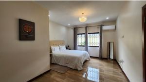 Postel nebo postele na pokoji v ubytování Marblearch Apartment